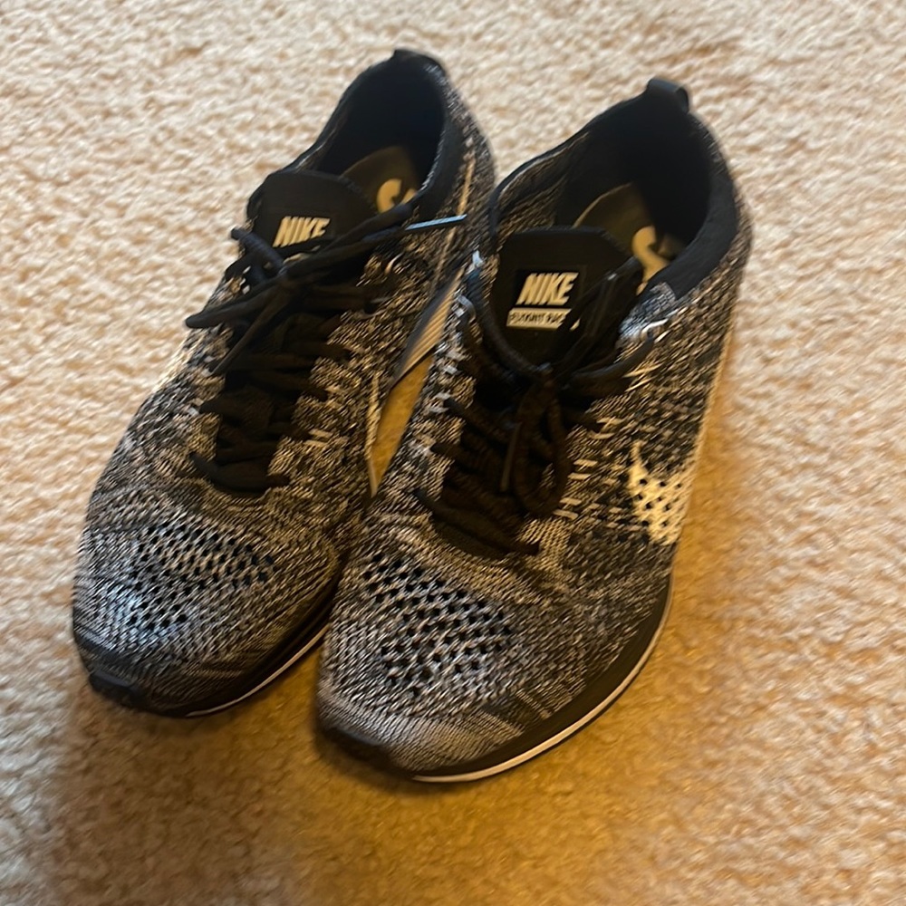 Black and white fly knit racers
